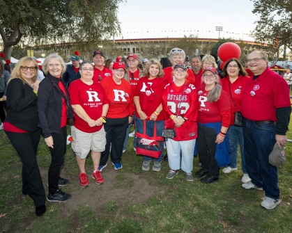 Bob Eichert, at right, and many of his former bandmates at the tailgate party.