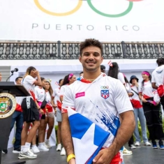 Rivera with the Puerto Rican flag at pre-Olympics ceremony