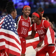 Kahleah Copper, at right, celebrates Gold medal