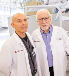 Dr. Craig Hirschberg, left, who has served as chairman of the endodontics department for 13 years, with Dr. Chivian. 